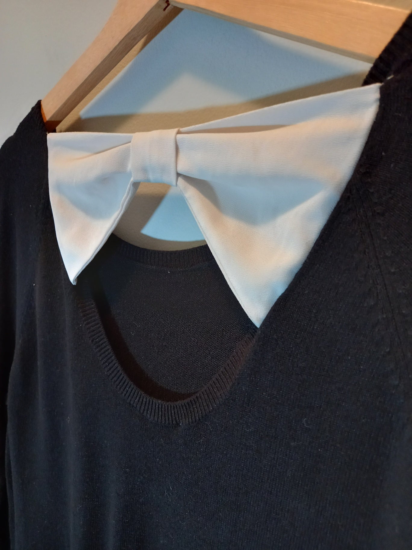Ricki's black bow sweater - Medium