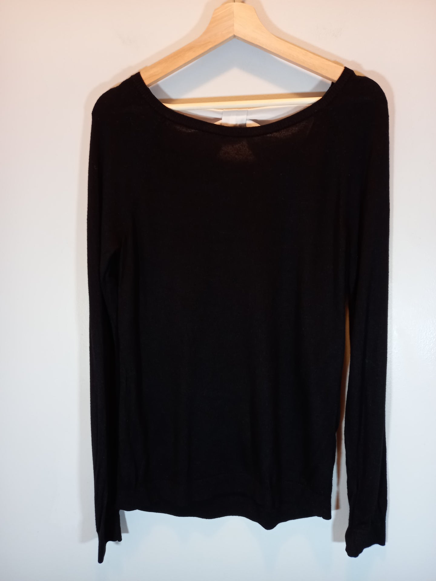 Ricki's black bow sweater - Medium