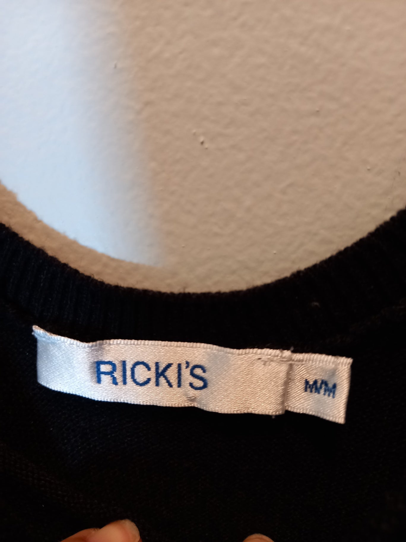 Ricki's black bow sweater - Medium