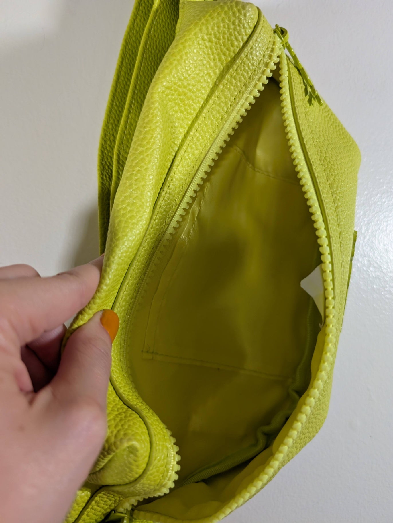 Melt cosmetics neon green sling bag 