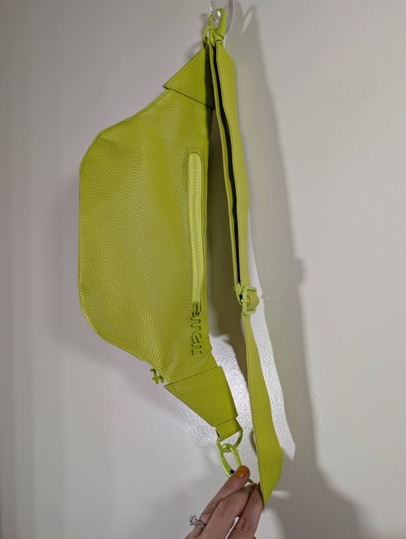 Melt cosmetics neon green sling bag 