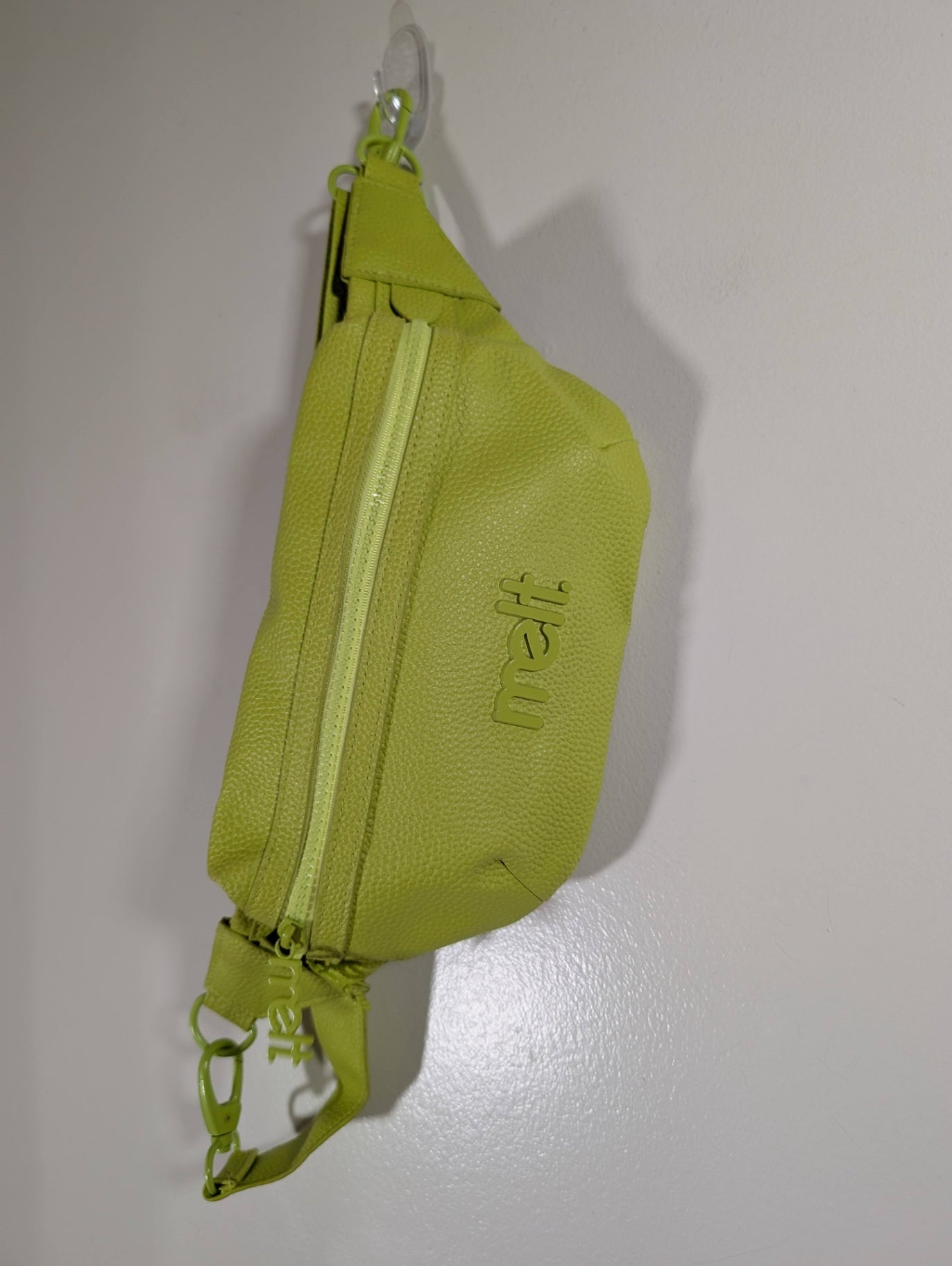 Melt cosmetics neon green sling bag 