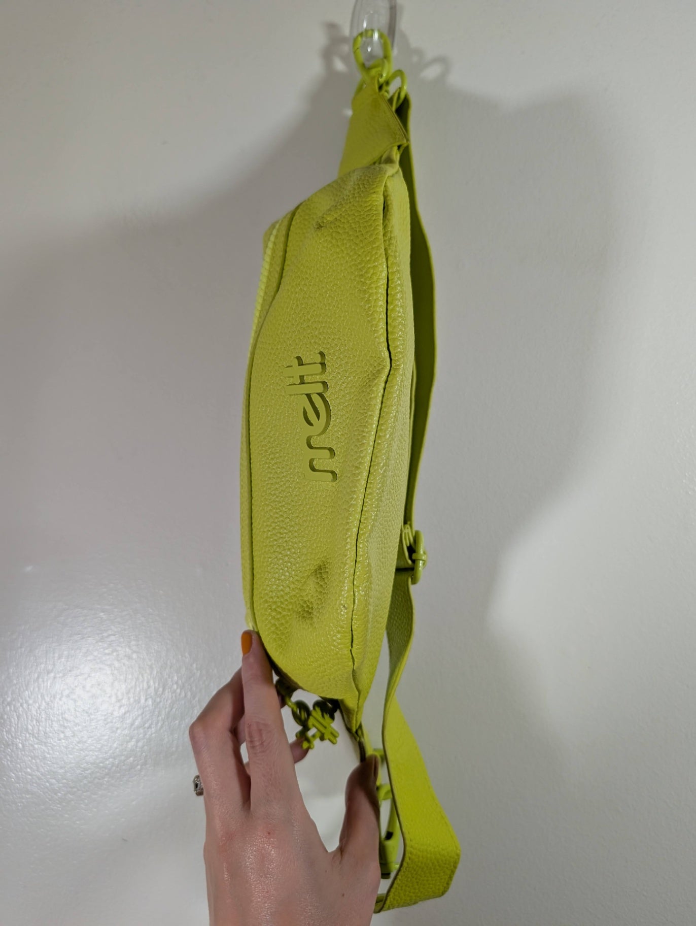 Melt cosmetics neon green sling bag 