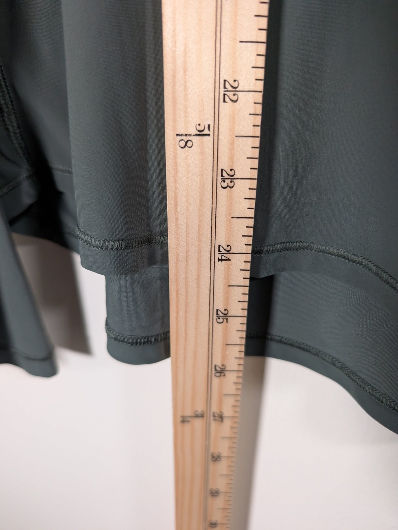 Lululemon green long-sleeve - appears 8/10