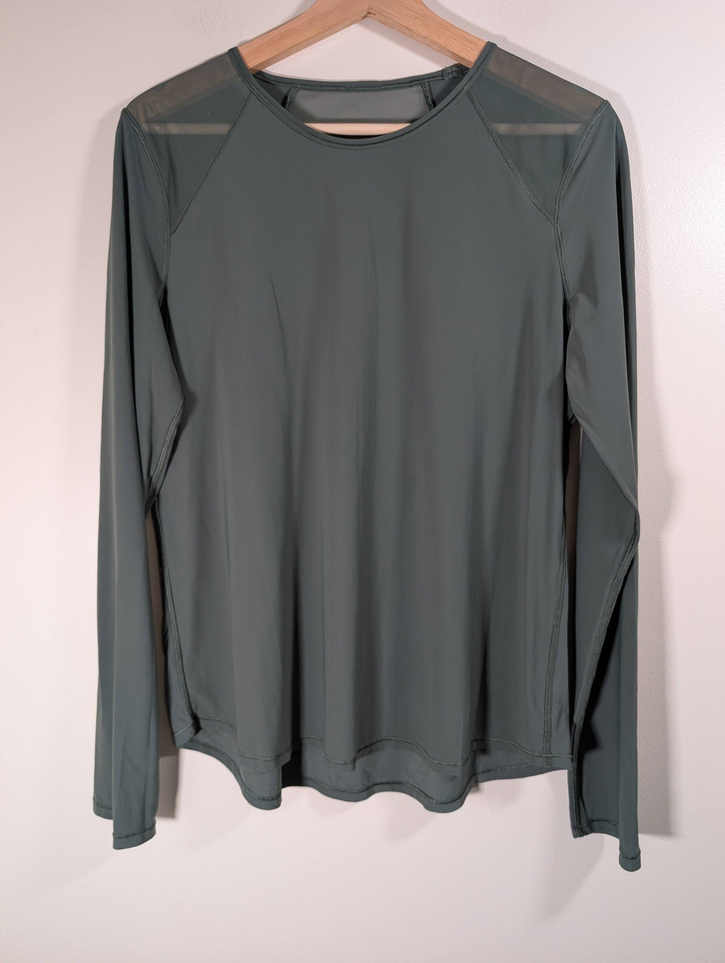 Lululemon green long-sleeve - appears 8/10