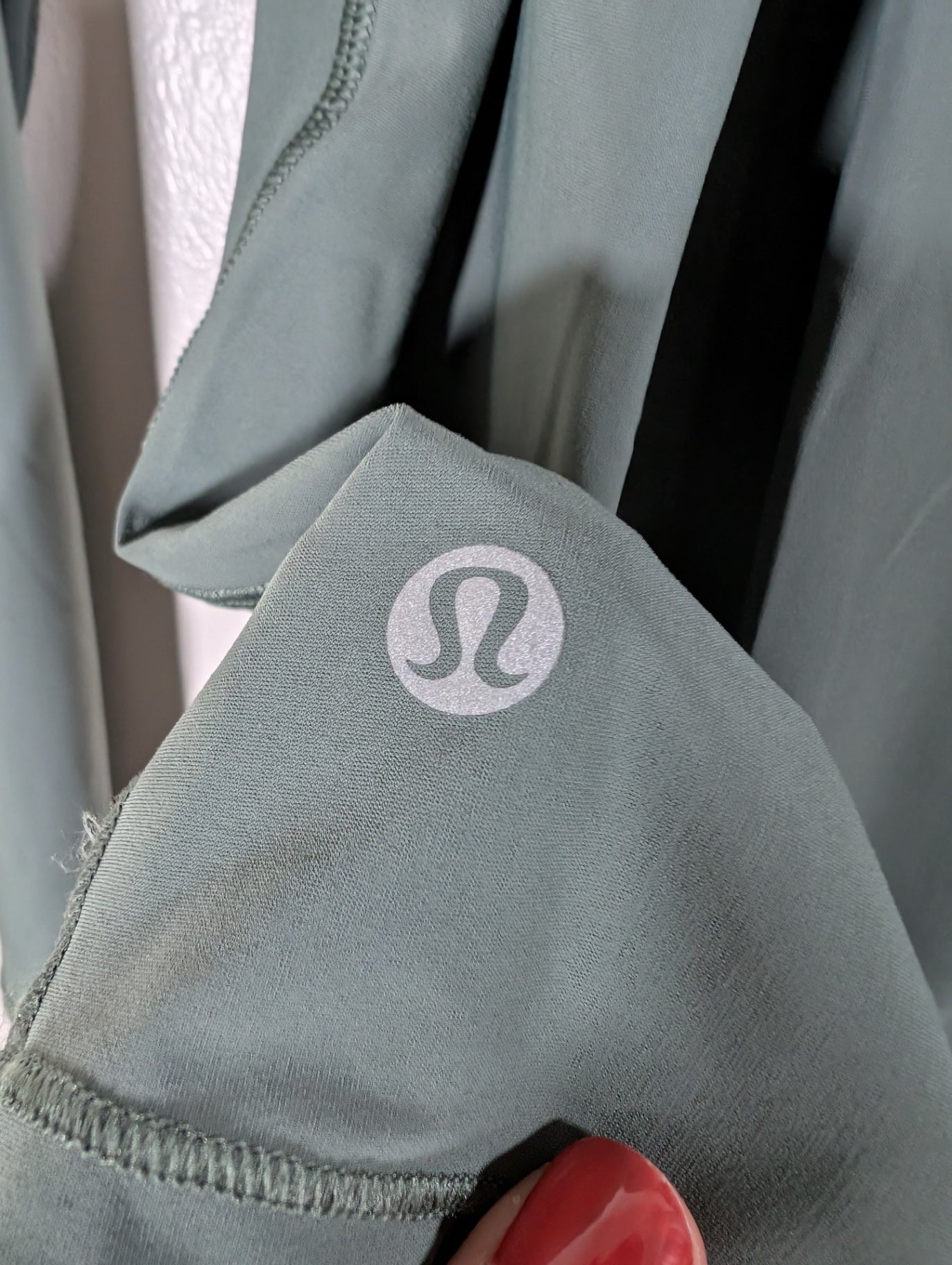 Lululemon green long-sleeve - appears 8/10