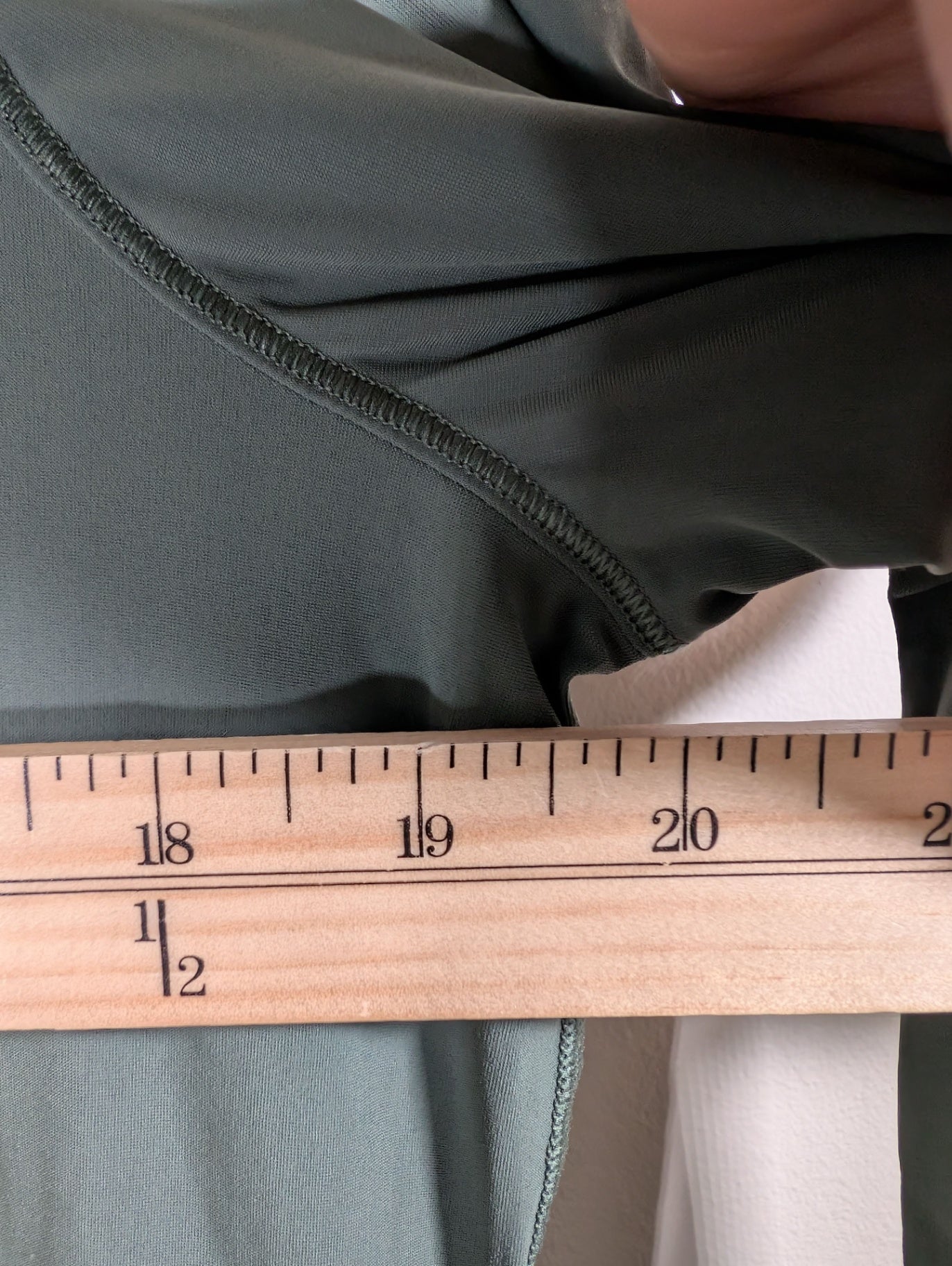 Lululemon green long-sleeve - appears 8/10