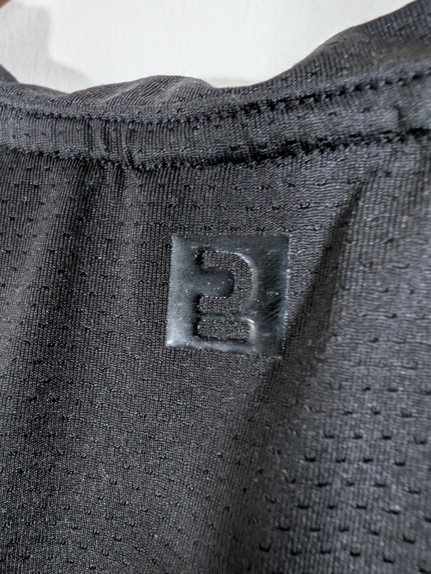 Black athletic t-shirt - appears medium