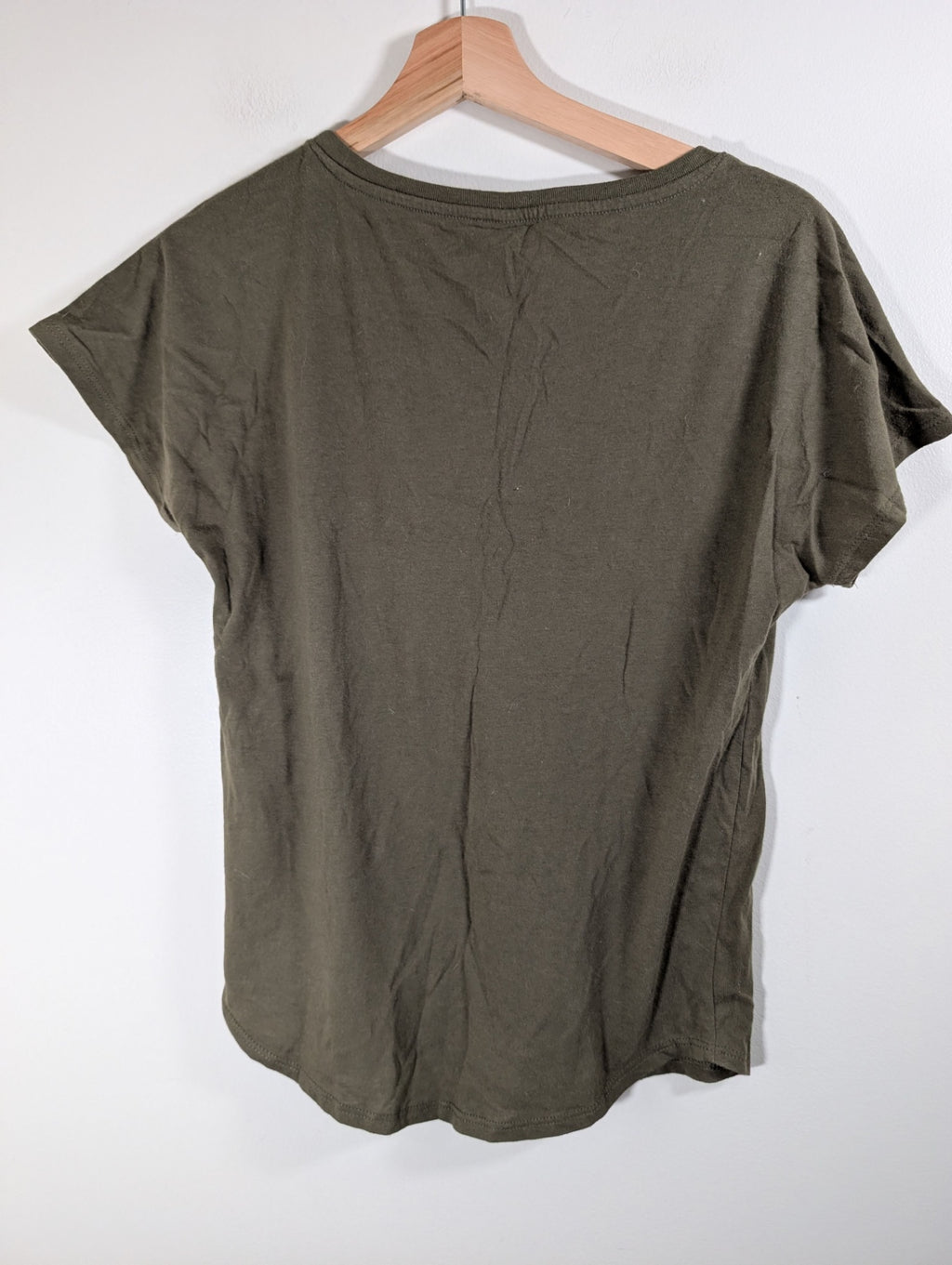 Green t-shirt - appears Small