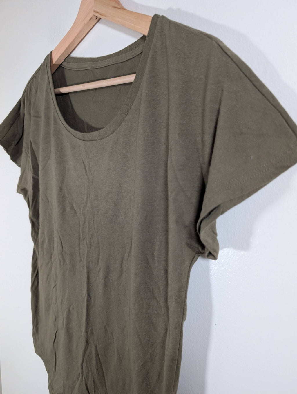 Green t-shirt - appears Small